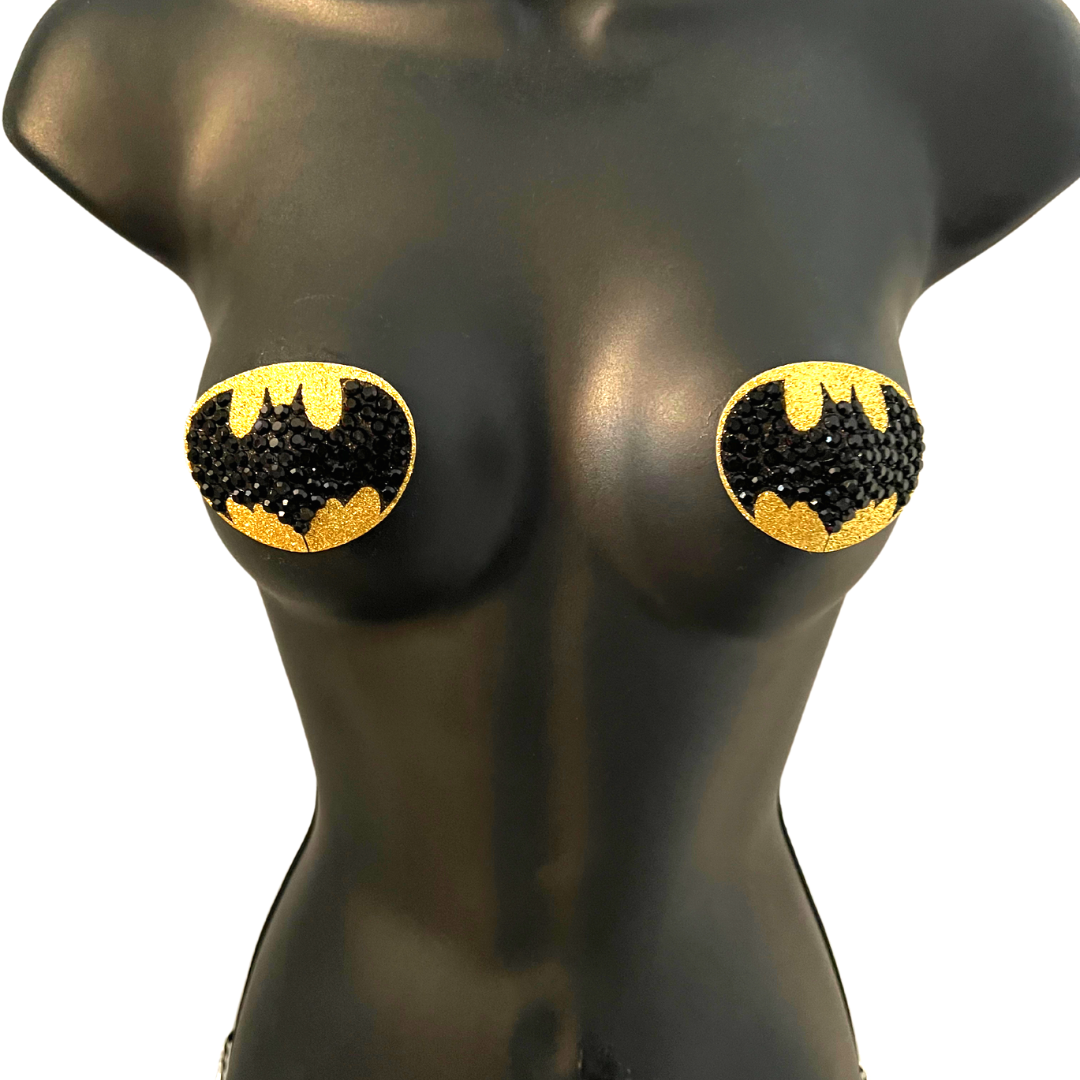 BAT SIGNAL Cache-tétons ovales dorés et noirs en forme de chauve-souris (2 pièces) pour les festivals de lingerie burlesque et Halloween